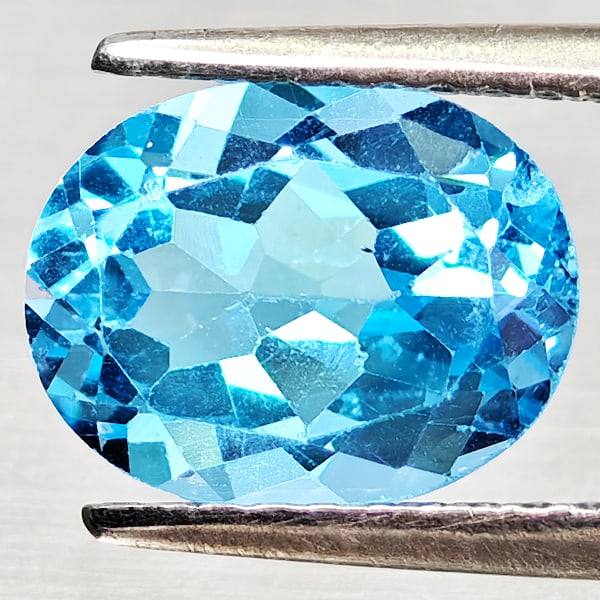 Natural Swiss Blue Topaz Gemstones 2.39 Ct. Oval Shape 9.1 x 7.1 Mm.: Product ID: 807168124 Product Name: Natural Blue Topaz Weight: 2.39 CT. Size: 9.1 x 7.1 x 4.8 MM. Shape: Oval Shape Color: Swiss Blue Clarity:VVS - VSI Luster: Good Gems Origin: Brazil Treatment: Trea