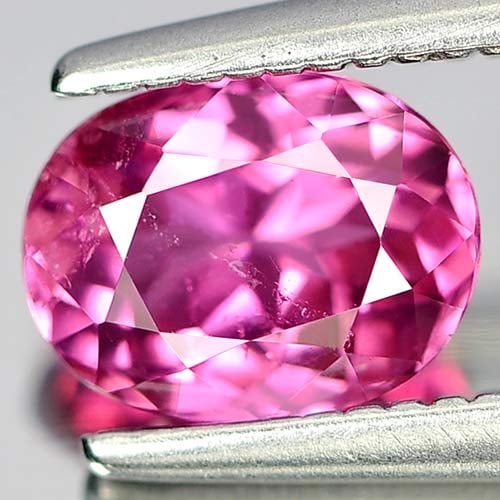 Natural Purplish Pink Tourmaline Gemstones 0.79 Ct. Oval Shape 6.6 x 5 Mm.: Product ID: 807241057 Product Name: Natural Tourmaline Weight: 0.79 CT. Size: 6.6 x 5 x 3.6 MM. Shape: Oval Color: Purplish Pink Clarity:VSI Luster: Good Gems Origin: Nigeria Treatment: Unheated Cryst