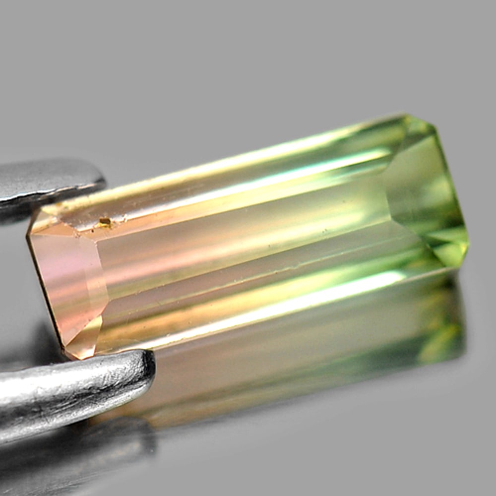 Natural Bi Color Tourmaline Gemstones 1.04 Ct. Octagon Shape 8.8 x 3.5 Mm.: Product ID: 807243347 Product Name: Natural Tourmaline Weight: 1.04 CT. Size: 8.8 x 3.5 x 3.3 MM. Shape: Octagon Color: Bi-Color Clarity:VSI Luster: Good Gems Origin: Nigeria Treatment: Unheated Cryst