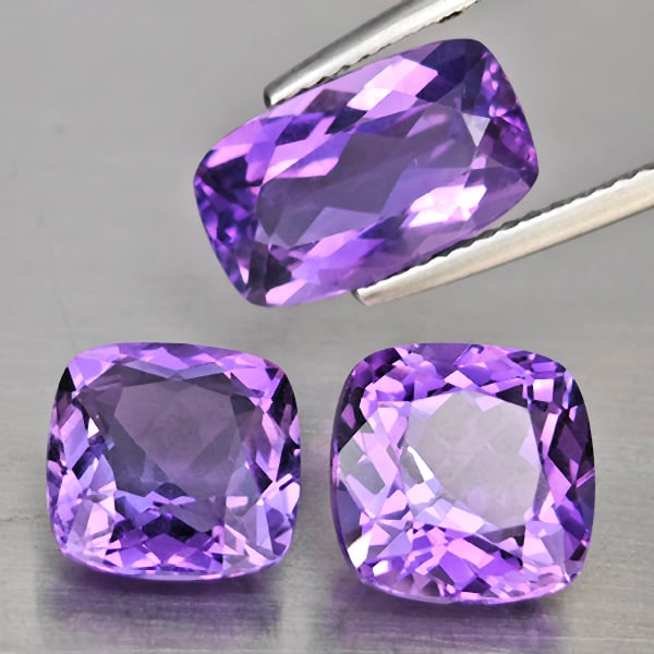 Natural Purple Amethyst Gemstones 9.74 Ct. 3 Pcs. Mixed Shape: Product ID: 800325707 Product Name: Natural Amethyst Weight: 9.74 CT. Size: 12.4 x 7.5 x 5.5 to 9 x 9 x 5.6 MM. Shape: Mixed Shape Color: Purple Clarity:VSI Luster: Good Gems Origin: Brazil Treatment: