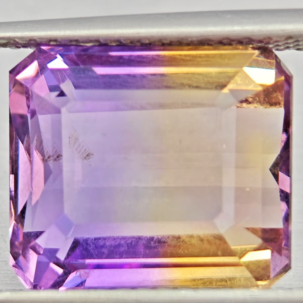 Natural Bi Color Ametrine Gemstones 7.22 Ct. Octagon Shape 12.2 x 10.6 Mm.: Product ID: 800408615 Product Name: Natural Ametrine Weight: 7.22 CT. Size: 12.2 x 10.6 x 7 MM. Shape: Octagon Color: Bi Color Clarity:VVS Luster: Good Gems Origin: Bolivia Treatment: Unheated Crystal