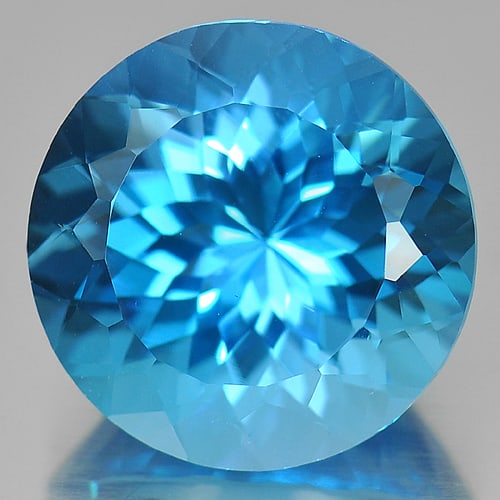 Natural Clean Swiss Blue Topaz 15.16 Ct. Round 15 Mm.: Product ID: 807166411 Product Name: Natural Blue Topaz Weight: 15.16 CT. Size: 15 x 15 x 10.4 MM. Shape: Round Color: Blue Clarity:IF Luster: Good Gems Origin: Brazil Treatment: Treated Crystal Struct
