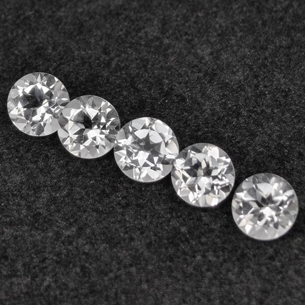 Natural White Topaz Gemstones 5.41 Ct. 5 Pcs. Round Shape 6.3 Mm.: Product ID: 807168785 Product Name: Natural Topaz Weight: 5.41 CT. Size: 6.3 x 6.3 x 4.3 MM. Shape: Round Color: White Clarity:VSI Luster: Good Gems Origin: Brazil Treatment: Unheated Crystal Structur
