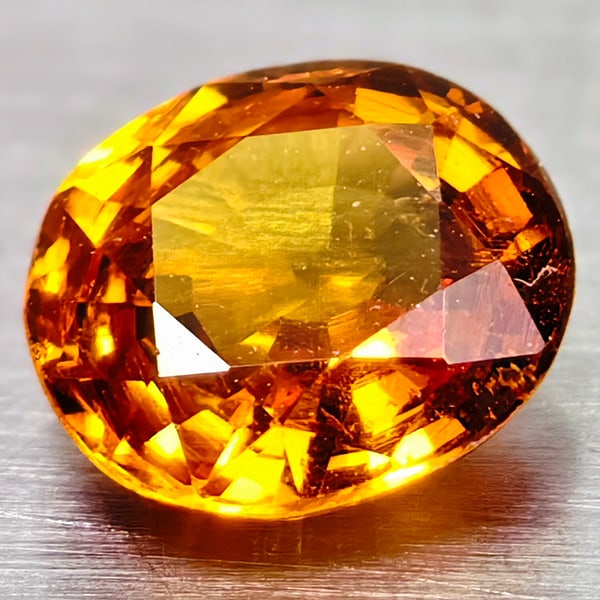 Natural Spessartine Garnet Gemstones 0.71 Ct. Oval Shape 5.4 x 4.8 Mm.: Product ID: 102904160 Product Name: Natural Spessartine Weight: 0.71 CT. Size: 5.4 x 4.8 x 2.8 MM. Shape: Oval Color: Orange Clarity:VSI Luster: Very Good Gems Origin: Nigeria Treatment: Unheated Crys