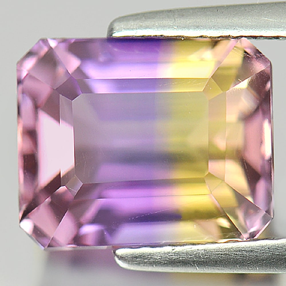Natural Bi Color Ametrine Gemstones 4.59 Ct. Octagon Shape 10 x 8.3 Mm.: Product ID: 800405163 Product Name: Natural Ametrine Weight: 4.59 CT. Size: 10 x 8.3 x 7 MM. Shape: Octagon Color: Bi Color Clarity:VVS Luster: Good Gems Origin: Bolivia Treatment: Unheated Crystal St