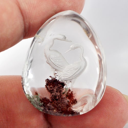 Natural Moss Quartz Gemstones 75.00 Ct. Birds Carving Inner Pear Cabochon Shape 33 x 26 Mm.: Product ID: 805527070 Product Name: Natural Quartz Weight: 75.00 CT. Size: 33 x 26 x 14 MM. Shape: Pear Cabochon Color: White Clarity:Semi - Transparent Luster: Good Gems Origin: Thailand Treatment: U