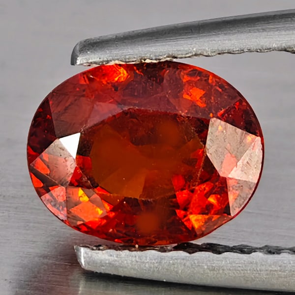 Natural Orangish Red Spessartine Garnet Gemstones 1.73 Ct. Oval Shape 7.7 x 6 Mm.: Product ID: 802937943 Product Name: Natural Garnet Weight: 1.73 CT. Size: 7.7 x 6 x 4.2 MM. Shape: Oval Color: Orangish Red Clarity:SI1 Luster: Good Gems Origin: Namibia Treatment: Unheated Crystal St