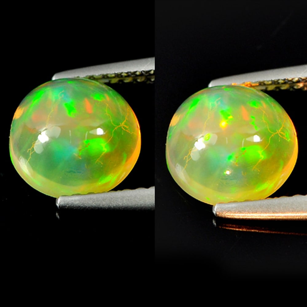 Natural Multi Color Opal Gemstones 1.38 Ct. Round Cabochon Shape 8 Mm.: Product ID: 818727059 Product Name: Natural Opal Weight: 1.38 CT. Size: 8 x 8 x 4.5 MM. Shape: Round Cabochon Color: Multi-Color Clarity:Semi - Transparent Luster: Iridescent Gems Origin: Ethiopia Tre