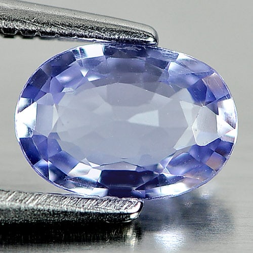 Natural Violet Blue Tanzanite Gemstones 0.71 Ct. Clean Oval Shape 7.1 x 5.1 Mm.: Product ID: 807001386 Product Name: Natural Tanzanite Weight: 0.71 CT. Size: 7.1 x 5.1 x 2.6 MM. Shape: Oval Color: Violet Blue Clarity:IF Luster: Good Gems Origin: Tanzania Treatment: Heated Crystal 