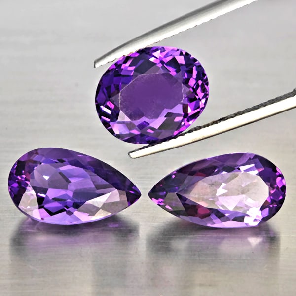 Natural Purple Amethyst Gemstones 12.24 Ct. 3 Pcs. Mixed Shape and Mixed Size: Product ID: 800325667 Product Name: Natural Amethyst Weight: 12.24 CT. Size: 14.2 x 8.2 x 6.5 to 12 x 10 x 6 MM. Shape: Mixed Shape Color: Purple Clarity:SI1 Luster: Good Gems Origin: Brazil Treatment