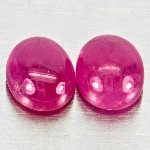 Natural Pink Red Jonson Ruby Gemstones 1.23 Ct. 2 Pcs. Oval Cabochon Shape 5.1 x 4.1 Mm.: Product ID: 805935777 Product Name: Natural Ruby Weight: 1.23 CT. Size: 5.1 x 4.1 x 2.8 MM. Shape: Oval Cabochon Color: Pink Red Clarity:Semi - Transparent Luster: Good Gems Origin: Mozambique Treatme