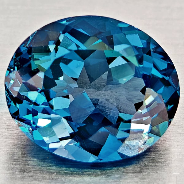 Natural London Blue Topaz Gemstones 4.28 Ct. Oval Shape 10.7 x 8.8 Mm.: Product ID: 807168398 Product Name: Natural Blue Topaz Weight: 4.28 CT. Size: 10.7 x 8.8 x 6 MM. Shape: Oval Shape Color: London Blue Clarity:VVS - VSI Luster: Good Gems Origin: Brazil Treatment: Trea