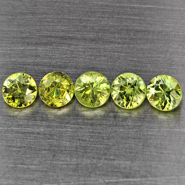 Natural Green Demantiod Garnet Gemstones 0.86 Ct. 5 Pcs. Round Diamond Cut 3.3 Mm.: Product ID: 802937684 Product Name: Natural Demantoid Weight: 0.86 CT. Size: 3.3 x 3.3 x 2.5 MM. Shape: Round Diamond Cut Color: Green Clarity:SI1 Luster: Good Gems Origin: Madagascar Treatment: Unhea