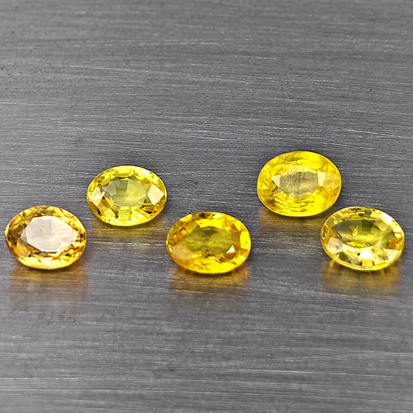 Natural Yellow Songea Sapphire Gemstones 1.62 Ct. 5 Pcs. Oval Shape 4.6 x 3.5 Mm.: Product ID: 806130412 Product Name: Natural Yellow Sapphire Weight: 1.62 CT. Size: 4.6 x 3.5 x 2 to 4.4 x 3.4 x 2.2 MM. Shape: Oval Shape Color: Yellow Clarity:SI1 Luster: Good Gems Origin: Tanzania T