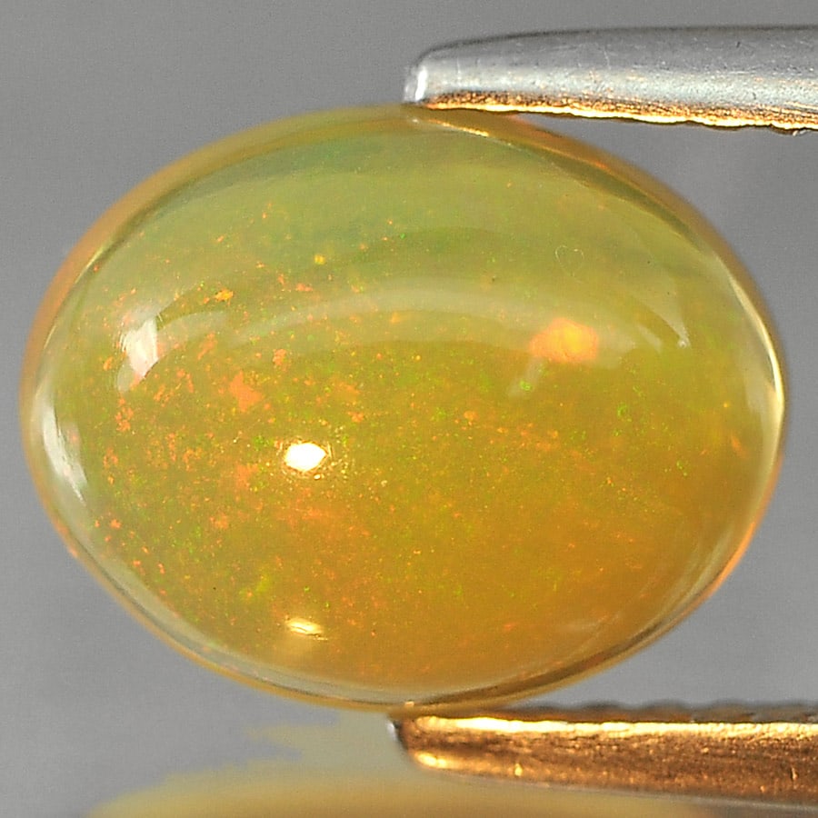 Natural Play Of Multi Color Gem Opal Gemstones 1.78 Ct. Oval Cabochon Shape 10 x 7.9 Mm. (1 of 3)
