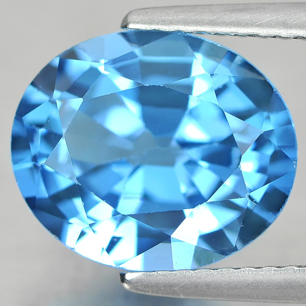 Natural Blue Topaz Gemstones 4.71 Ct. Oval Shape 11.3 x 9.5 Mm. (1 of 3)