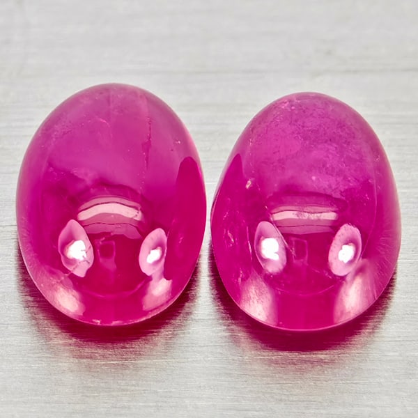 Natural Pink Red Jonson Ruby Gemstones 1.70 Ct. 2 Pcs. Oval Cabochon Shape 6.2 x 4.3 Mm.: Product ID: 805935791 Product Name: Natural Ruby Weight: 1.70 CT. Size: 6.2 x 4.3 x 3 MM. Shape: Oval Cabochon Color: Pink Red Clarity:Semi - Transparent Luster: Good Gems Origin: Mozambique Treatment
