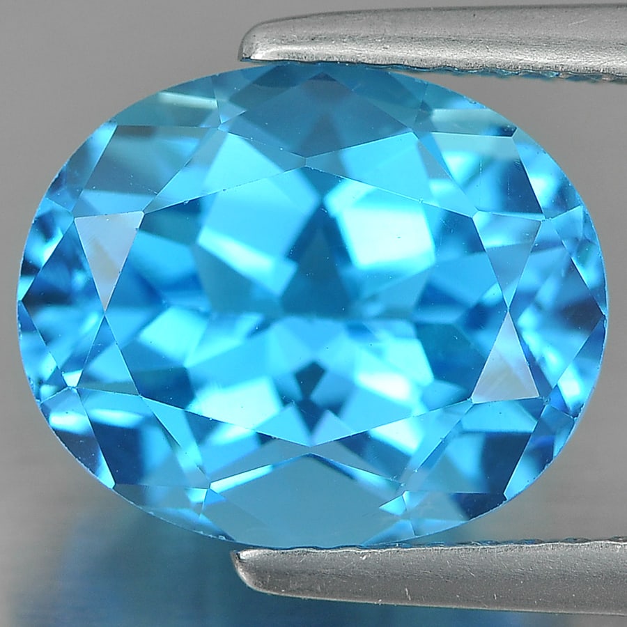 Natural Swiss Blue Topaz Gemstones 5.11 Ct. Oval Shape 11 x 9 Mm.: Product ID: 807160590 Product Name: Natural Blue Topaz Weight: 5.11 CT. Size: 11 x 9 x 6.7 MM. Shape: Oval Color: Blue Clarity:VVS Luster: Good Gems Origin: Brazil Treatment: Treated Crystal Structure