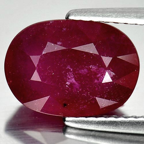 Natural Purplish Red Ruby Gemstones 4.94 Ct. Oval Shape 11.6 x 8.3 Mm.: Product ID: 805928596 Product Name: Natural Ruby Weight: 4.94 CT. Size: 11.6 x 8.3 x 5.2 MM. Shape: Oval Color: Purplish Red Clarity:VSI Luster: Good Gems Origin: Madagascar Treatment: Heated (Lead-gl