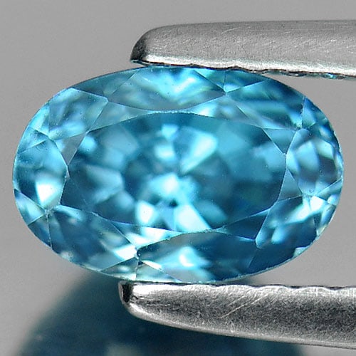 Natural Blue Zircon Gemstones 1.78 Ct. Oval Shape 7.2 x 4.8 Mm.: Product ID: 807720898 Product Name: Natural Zircon Weight: 1.78 CT. Size: 7.2 x 4.8 x 5 MM. Shape: Oval Color: Blue Clarity:VVS Luster: Very Good Gems Origin: Cambodia Treatment: Heated Crystal Struct