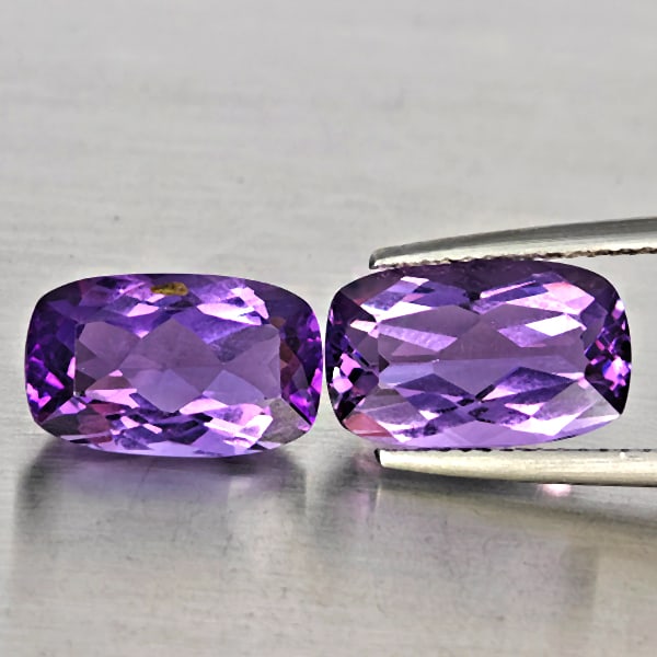 Natural Purple Amethyst Gemstones 6.93 Ct. 2 Pcs. Cushion Shape 12.5 x 7.6 Mm.: Product ID: 800325676 Product Name: Natural Amethyst Weight: 6.93 CT. Size: 12.5 x 7.6 x 5.5 MM. Shape: Cushion Shape Color: Purple Clarity:VSI Luster: Good Gems Origin: Brazil Treatment: Unheated Cry