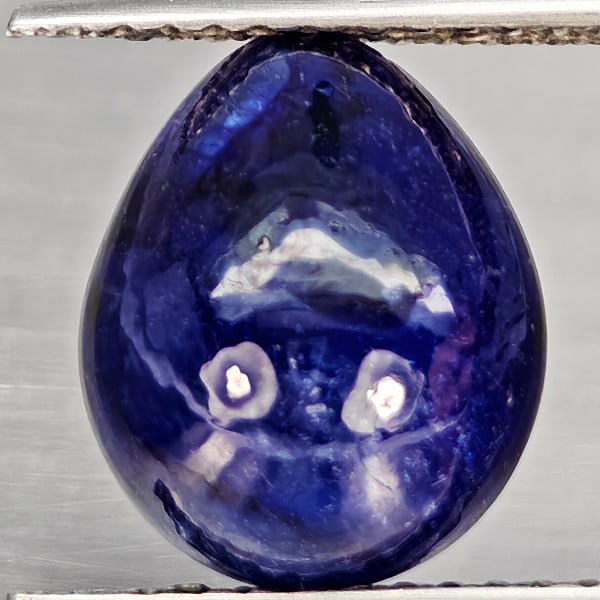 Natural Blue Sapphire Gemstones 5.01 Ct. Pear Cabochon Shape 10.6 x 8.8 Mm.: Product ID: 806012334 Product Name: Natural Blue Sapphire Weight: 5.01 CT. Size: 10.6 x 8.8 x 5.9 MM. Shape: Pear Cabochon Color: Blue Clarity:Semi - Transparent Luster: Good Gems Origin: Madagascar T