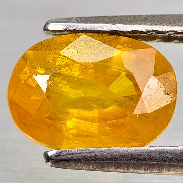 Natural Yellow Sapphire Gemstones 1.51 Ct. Oval Shape 7.6 x 5.5 Mm.: Product ID: 806162577 Product Name: Natural Yellow Sapphire Weight: 1.51 CT. Size: 7.6 x 5.5 x 3.9 MM. Shape: Oval Color: Yellow Clarity:VSI - SI1 Luster: Good Gems Origin: Thailand Treatment: Heated 