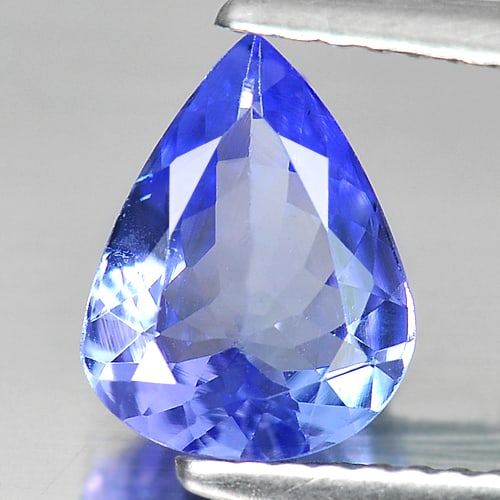 Natural Violetish Blue Tanzanite Gemstones 1.35 Ct. Pear Shape 7.13 x 9.13 Mm.: Product ID: 807009433 Product Name: Natural Tanzanite Weight: 1.35 CT. Size: 7.13 x 9.13 x 3.36 MM. Shape: Pear Color: Violetish Blue Clarity:VVS Luster: Good Gems Origin: Tanzania Treatment: Heated C