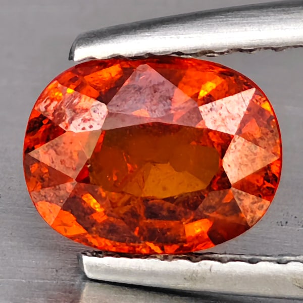 Natural Orangish Red Spessartine Garnet Gemstones 1.77 Ct. Oval Shape 7.7 x 6 Mm.: Product ID: 802937955 Product Name: Natural Garnet Weight: 1.77 CT. Size: 7.7 x 6 x 4.2 MM. Shape: Oval Color: Orangish Red Clarity:SI1 Luster: Good Gems Origin: Namibia Treatment: Unheated Crystal St