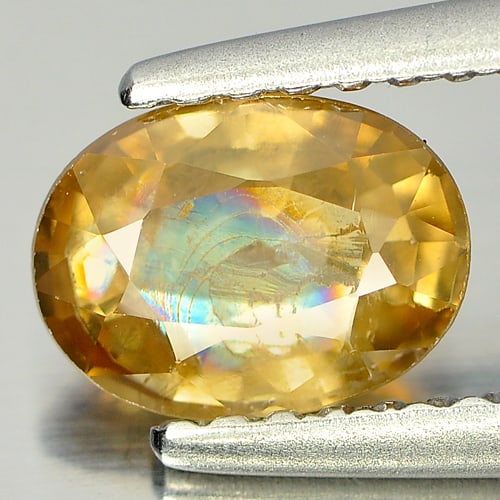 Natural Yellow Zircon Gemstones 1.15 Ct. Oval Shape 7 x 5.2 Mm.: Product ID: 807726822 Product Name: Natural Zircon Weight: 1.15 CT. Size: 7 x 5.2 x 3.1 MM. Shape: Oval Color: Yellow Clarity:SI Luster: Good Gems Origin: Cambodia Treatment: Heated Crystal Structure: