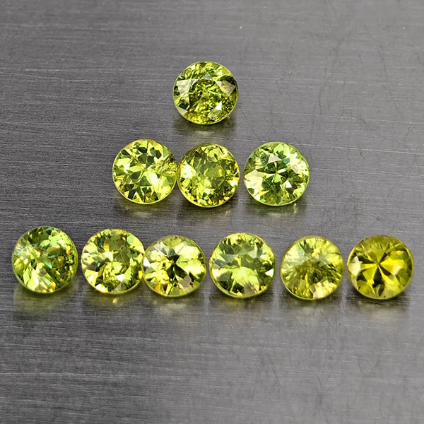 Natural Green Demantiod Garnet Gemstones 1.48 Ct. 10 Pcs. Round Diamond Cut 3.2 Mm.: Product ID: 802937706 Product Name: Natural Demantoid Weight: 1.48 CT. Size: 3.2 x 3.2 x 2.2 MM. Shape: Round Diamond Cut Color: Green Clarity:SI1 Luster: Good Gems Origin: Madagascar Treatment: Unhea