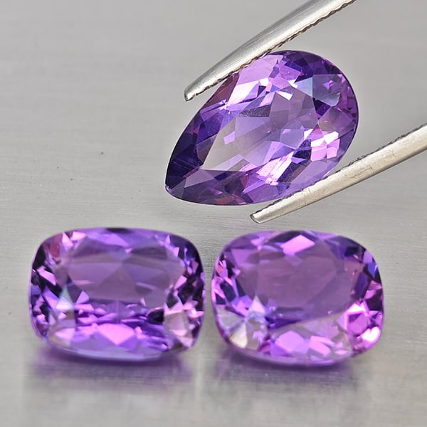 Natural Purple Amethyst Gemstones 9.39 Ct. 3 Pcs. Mixed Shape and Mixed Size: Product ID: 800325678 Product Name: Natural Amethyst Weight: 9.39 CT. Size: 13.2 x 8.6 x 6 to 10.3 x 8.5 x 5.8 MM. Shape: Mixed Shape Color: Purple Clarity:VSI Luster: Good Gems Origin: Brazil Treatme