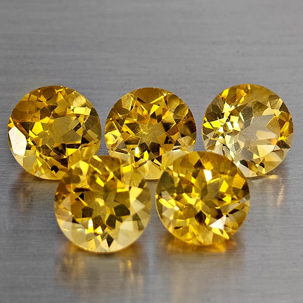 Natural Yellow Citrine Gemstones 6.06 Ct. 5 Pcs. Round Shape 7.2 Mm.: Product ID: 801815451 Product Name: Natural Citrine Weight: 6.06 CT. Size: 7.2 x 7.2 x 5 MM. Shape: Round Shape Color: Yellow Clarity:VSI Luster: Good Gems Origin: Brazil Treatment: Unheated Crystal S