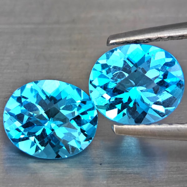 Natural Swiss Blue Topaz Gemstones 2.61 Ct. 2 Pcs. Oval Shape 7.4 x 6.3 Mm.: Product ID: 807169060 Product Name: Natural Blue Topaz Weight: 2.61 CT. Size: 7.4 x 6.3 x 4.3 MM. Shape: Oval Shape Color: Swiss Blue Clarity:VSI Luster: Good Gems Origin: Brazil Treatment: Treated Cr