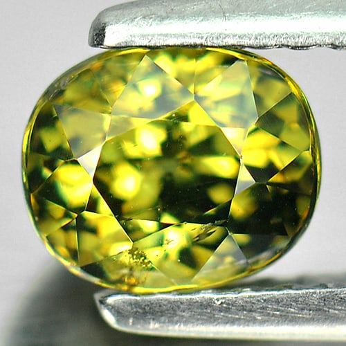 Natural Green Demantoid Garnet Gemstones 1.36 Ct. Oval Shape 6.19 x 5.24 Mm.: Product ID: 802921200 Product Name: Natural Demantoid Weight: 1.36 CT. Size: 6.19 x 5.24 x 4.77 MM. Shape: Oval Color: Green Clarity:SI1 Luster: Very Good Gems Origin: Mardagascar Treatment: Unheated 
