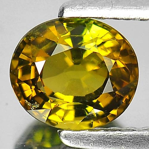 Natural Greenish Yellow Tourmaline Gemstones 0.93 Ct. Oval Shape 6.5 x 5.7 Mm.: Product ID: 807246211 Product Name: Natural Tourmaline Weight: 0.93 CT. Size: 6.5 x 5.7 x 4 MM. Shape: Oval Color: Greenish Yellow Clarity:VSI Luster: Good Gems Origin: Nigeria Treatment: Unheated Cry