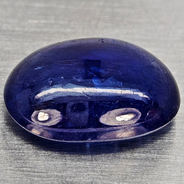 Natural Blue Sapphire Gemstones 4.64 Ct. Oval Cabochon Shape 11.3 x 8.5 Mm.: Product ID: 806012353 Product Name: Natural Blue Sapphire Weight: 4.64 CT. Size: 11.3 x 8.5 x 4.5 MM. Shape: Oval Cabochon Color: Blue Clarity:Semi - Transparent Luster: Good Gems Origin: Madagascar T