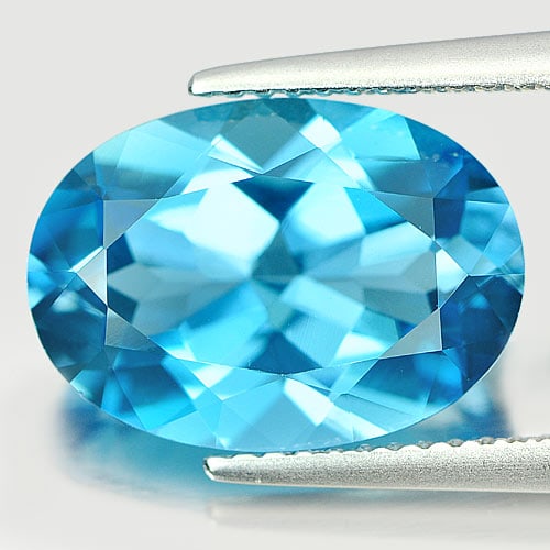 Natural London Blue Topaz Gemstones 6.76 Ct. Oval Shape 14 x 10 Mm.: Product ID: 807165540 Product Name: Natural Blue Topaz Weight: 6.76 CT. Size: 14 x 10 x 6.5 MM. Shape: Oval Color: Blue Clarity:IF Luster: Good Gems Origin: Brazil Treatment: Treated Crystal Structure