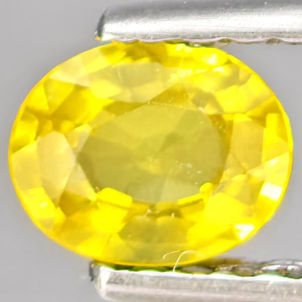 Natural Yellow Sapphire Gemstones 0.39 Ct. Oval Shape 5 x 4.2 Mm.: Product ID: 806162783 Product Name: Natural Yellow Sapphire Weight: 0.39 CT. Size: 5 x 4.2 x 2.4 MM. Shape: Oval Shape Color: Yellow Clarity:VSI Luster: Good Gems Origin: Thailand Treatment: Heated Cr