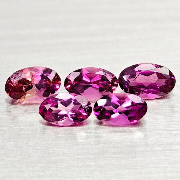 Natural Pink Tourmaline Gemstones 1.16 Ct. 5 Pcs. Oval Shape Mixed Size: Product ID: 807250966 Product Name: Natural Tourmaline Weight: 1.16 CT. Size: 5.3 x 3.3 x 2.2 to 4.9 x 2.9 x 2.4 MM. Shape: Oval Color: Pink Clarity:VSI Luster: Good Gems Origin: Nigeria Treatment: Un