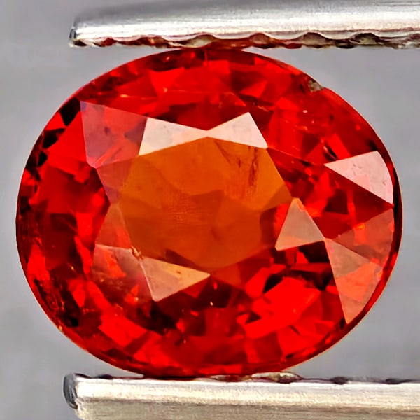 Natural Orangish Red Spessartine Garnet Gemstones 0.95 Ct. Oval Shape 6.2 x 5.4 Mm.: Product ID: 802937322 Product Name: Natural Garnet Weight: 0.95 CT. Size: 6.2 x 5.4 x 3.4 MM. Shape: Oval Shape Color: Orangish Red Clarity:SI1 Luster: Good Gems Origin: Namibia Treatment: Unheated Cr