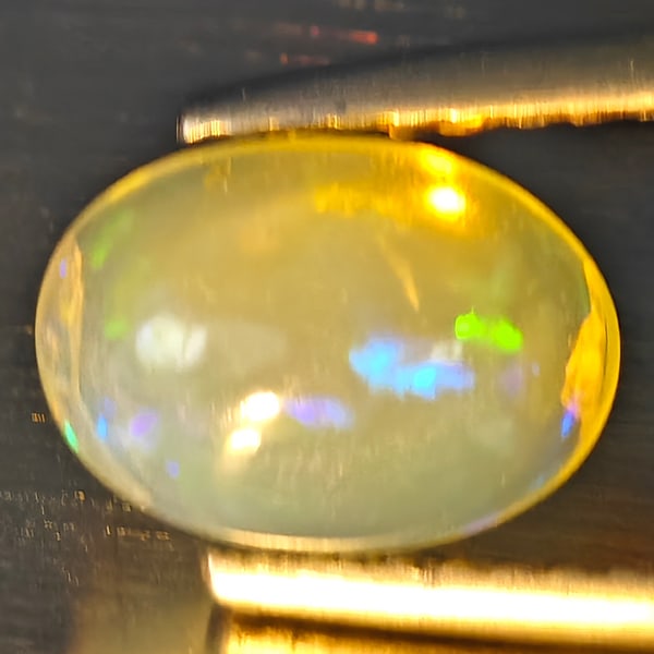 Natural Multi Color Opal Gemstones 1.50 Ct. Oval Cabochon Shape 8.7 x 6.4 Mm.