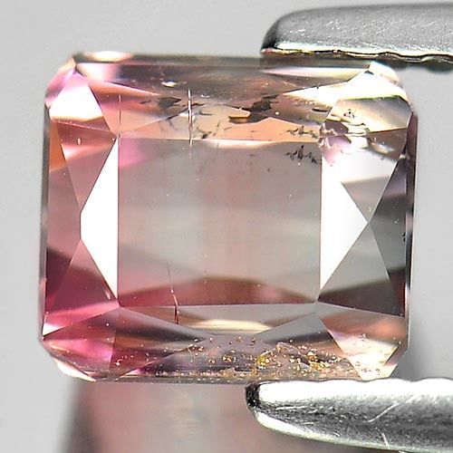 Natural Bi Color Tourmaline Gemstones 1.81 Ct. Octagon Shape 6.6 x 5.8 Mm.: Product ID: 807230420 Product Name: Natural Tourmaline Weight: 1.81 CT. Size: 6.6 x 5.8 x 4.8 MM. Shape: Octagon Color: Bi Color Clarity:SI1 Luster: Good Gems Origin: Nigeria Treatment: Unheated Cryst