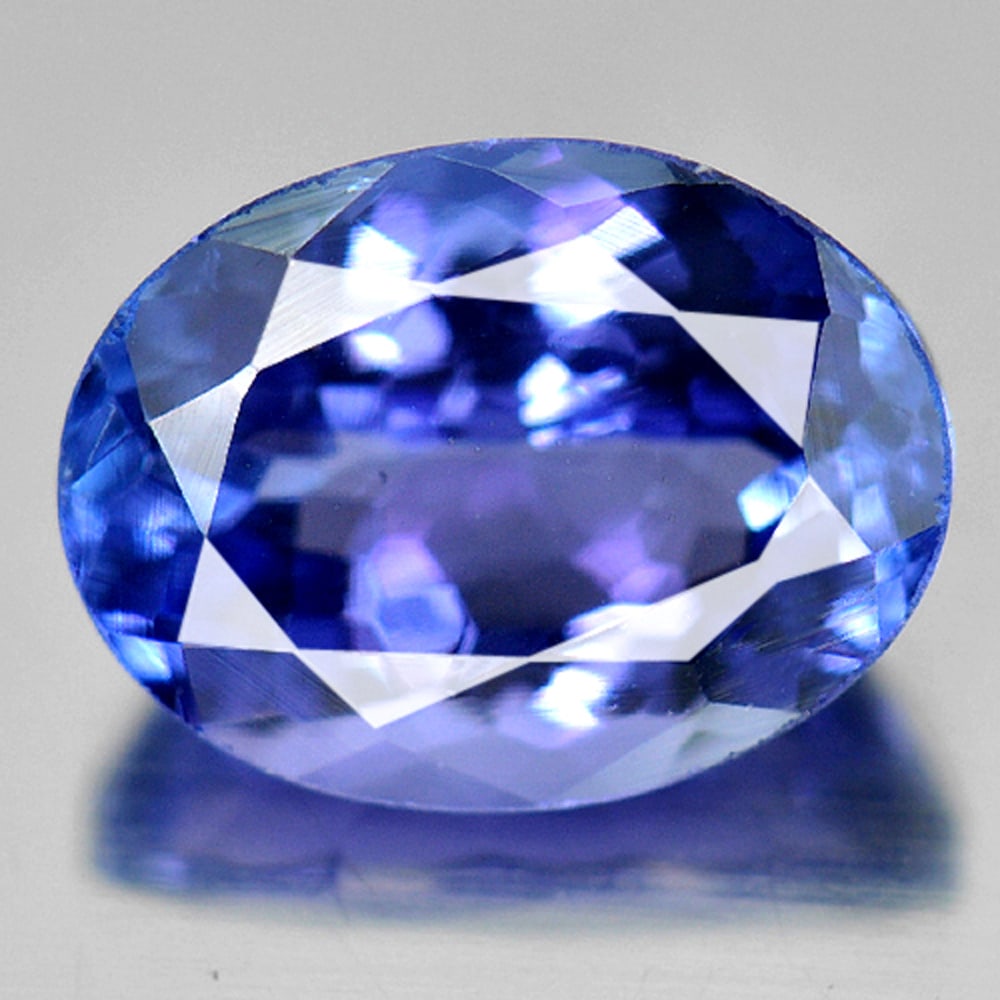 Natural Blue Tanzanite Gemstones 1.79 Ct. Oval Shape 8.6 x 6.5 Mm.: Product ID: 807009059 Product Name: Natural Tanzanite Weight: 1.79 CT. Size: 8.6 x 6.5 x 4.3 MM. Shape: Oval Color: Violetish Blue Clarity:VVS Luster: Good Gems Origin: Tanzania Treatment: Heated Crys