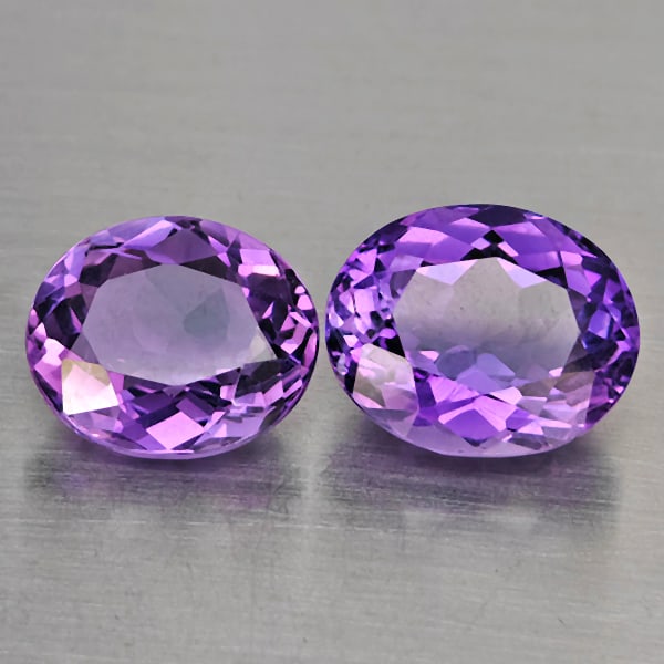 Natural Purple Amethyst Gemstones 8.40 Ct. 2 Pcs. Oval Shape 11.1 x 9.4 Mm.: Product ID: 800325708 Product Name: Natural Amethyst Weight: 8.40 CT. Size: 11.1 x 9.4 x 6 to 12 x 9.7 x 7.3 MM. Shape: Oval Shape Color: Purple Clarity:VSI Luster: Good Gems Origin: Brazil Treatment: