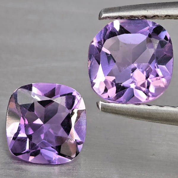 Natural Purple Amethyst Gemstones 1.38 Ct. 2 Pcs. Cushion Shape 6.2 Mm.: Product ID: 800325567 Product Name: Natural Amethyst Weight: 1.38 CT. Size: 6.2 x 6.2 x 3.7 MM. Shape: Cushion Shape Color: Purple Clarity:VSI Luster: Good Gems Origin: Brazil Treatment: Unheated Crys
