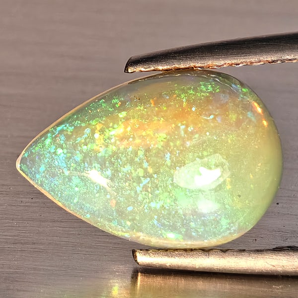 Natural Multi-Color Play Of Colour Opal Gemstone 1.81 Ct. Pear Cabochon Shape 12.8 x 8.5 Mm.