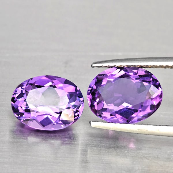 Natural Purple Amethyst Gemstones 5.06 Ct. 2 Pcs. Oval Shape 10.5 x 8.3 Mm.: Product ID: 800325652 Product Name: Natural Amethyst Weight: 5.06 CT. Size: 10.5 x 8.3 x 5.1 MM. Shape: Oval Shape Color: Purple Clarity:VSI Luster: Good Gems Origin: Brazil Treatment: Unheated Crysta