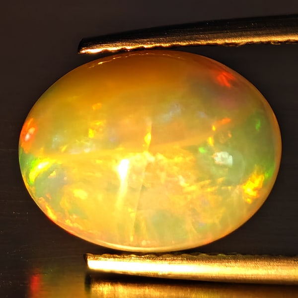Natural Multi-Color Play Of Colour Opal Gemstone 2.13 Ct. Oval Cabochon Shape 9.9 x 8 Mm.