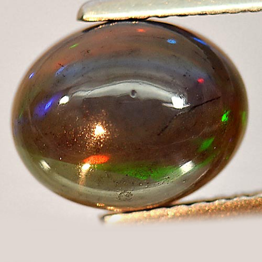 Natural Opal Multi-Color Gemstones 1.86 Ct. Oval Cabochon Shape 10 x 8.1 Mm.